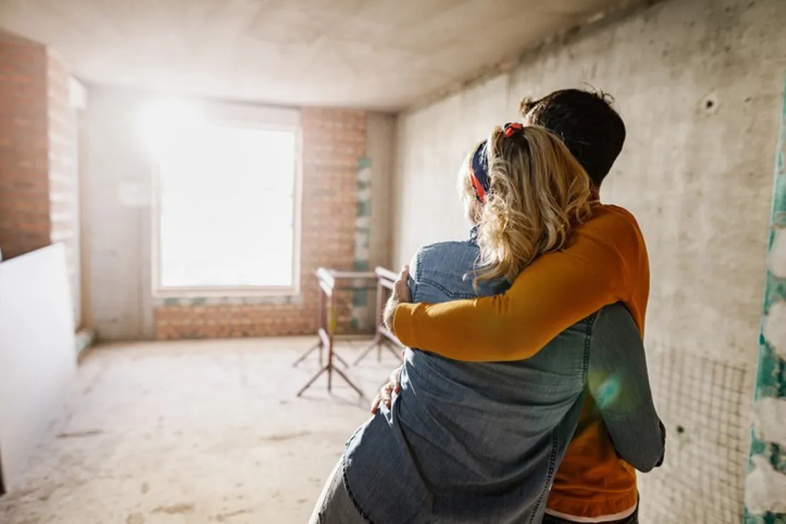 couple admiring home improvements