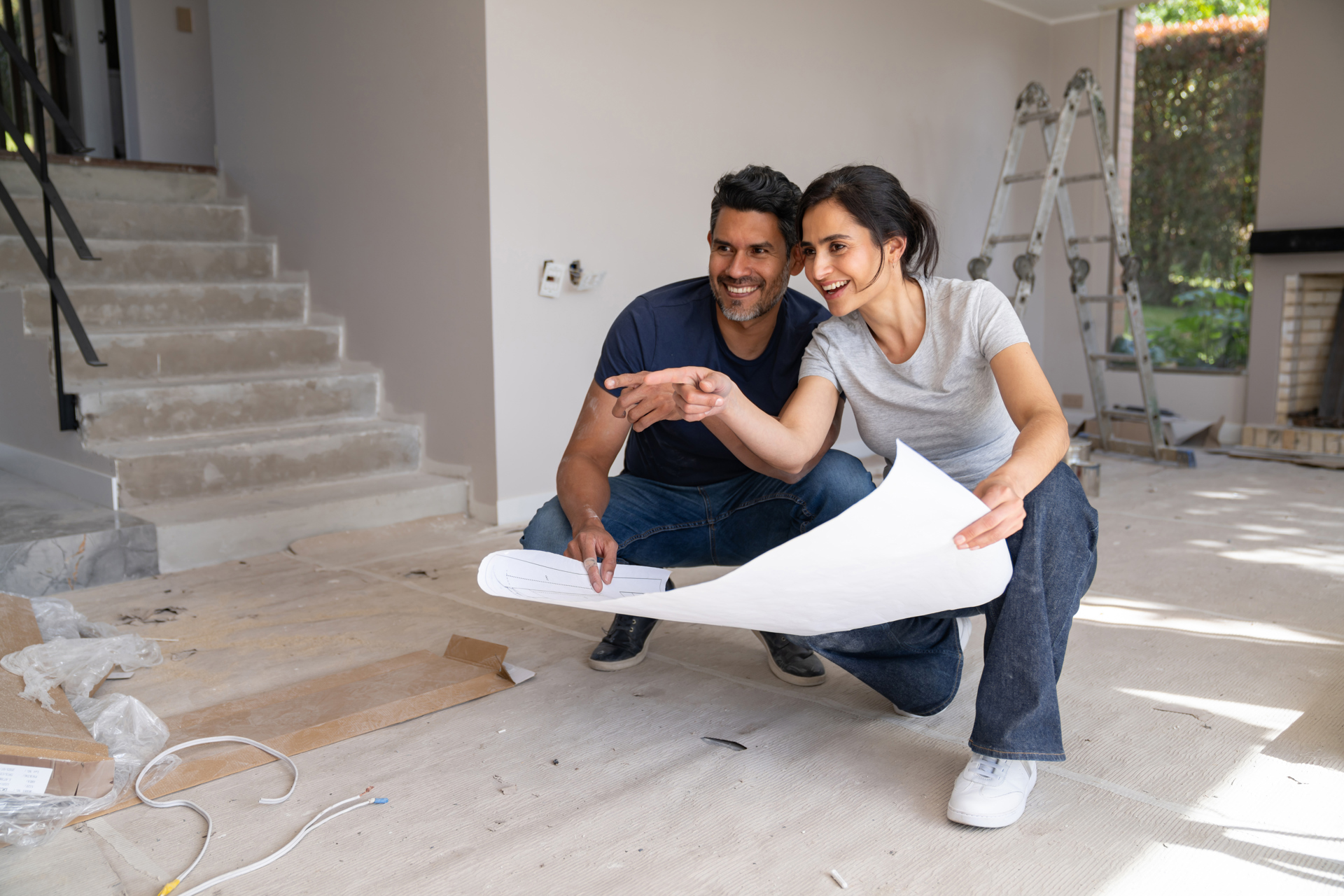 couple discuss house extension and costs
