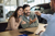 Couple buying a car based on the brand